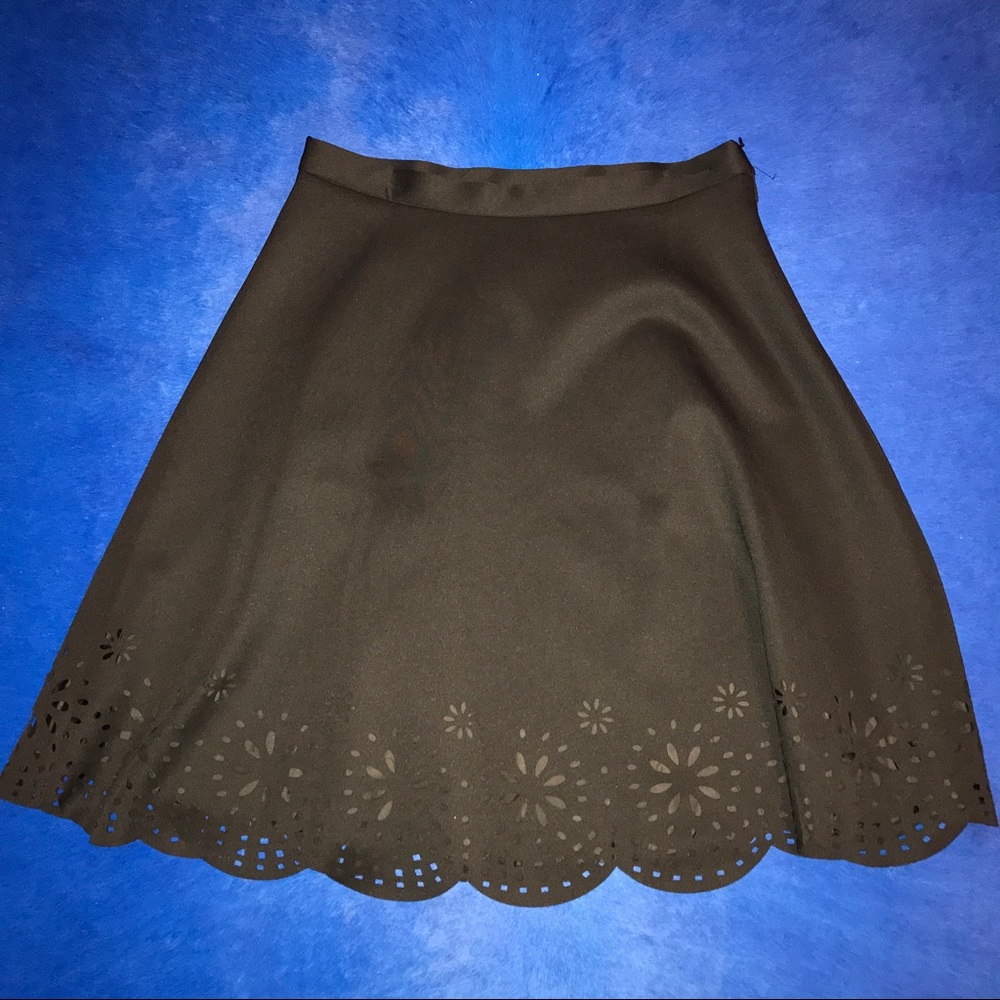 Black circle skirt with eyelet detail
